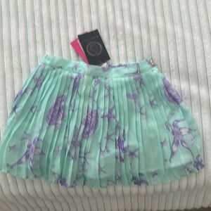 Young Versace GIRL skirt. ADJUSTable waist and 11.5” LONG. Brand NEW, never worn